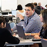 Gus Marlagoutsos and Dewi Tanuwidjaja (Royal Bank of Canada) share ideas with other external partners.