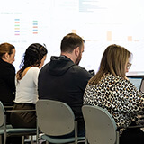 Members of multiple securities commissions work on disruption operations.